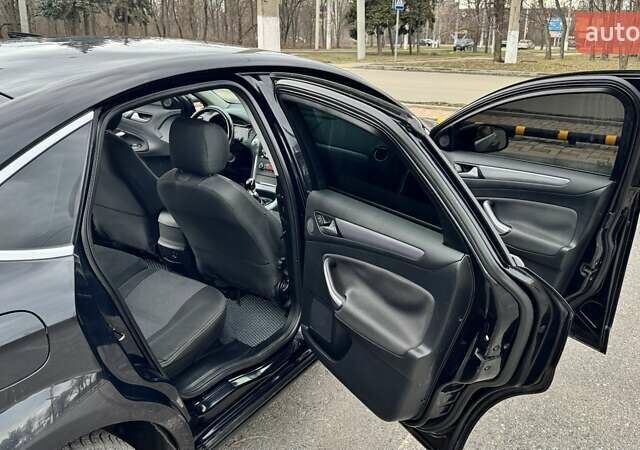 Черный Форд Мондео, объемом двигателя 2 л и пробегом 325 тыс. км за 8800 $, фото 20 на Automoto.ua