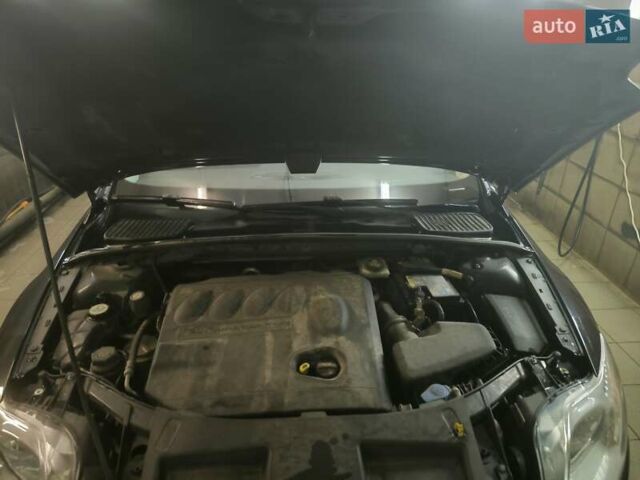 Чорний Форд Мондео, об'ємом двигуна 2 л та пробігом 185 тис. км за 8999 $, фото 2 на Automoto.ua