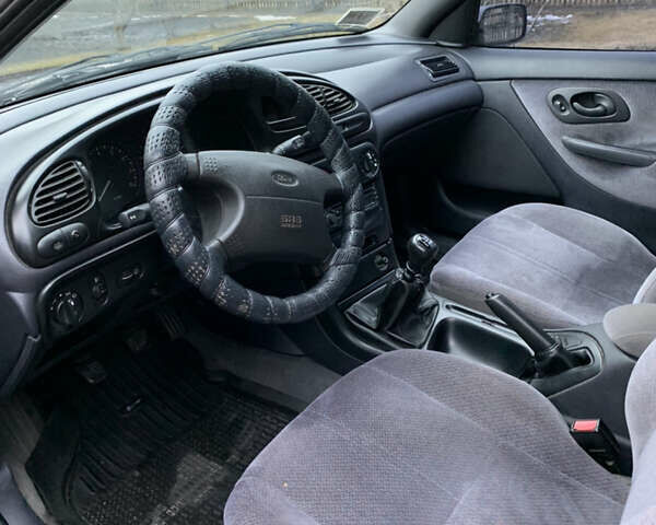 Фиолетовый Форд Мондео, объемом двигателя 1.8 л и пробегом 143 тыс. км за 2900 $, фото 8 на Automoto.ua