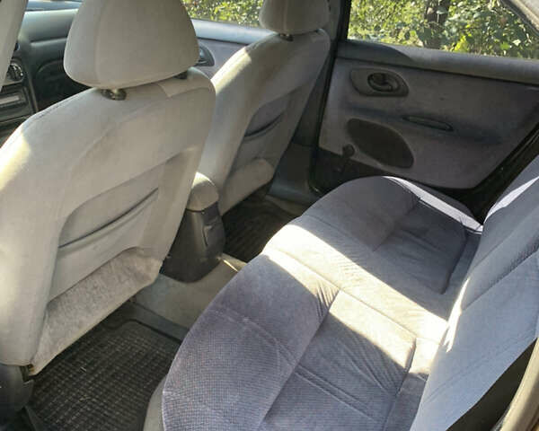 Фиолетовый Форд Мондео, объемом двигателя 1.8 л и пробегом 143 тыс. км за 2900 $, фото 3 на Automoto.ua