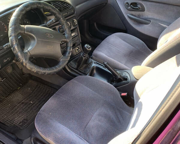 Фиолетовый Форд Мондео, объемом двигателя 1.8 л и пробегом 143 тыс. км за 2900 $, фото 2 на Automoto.ua