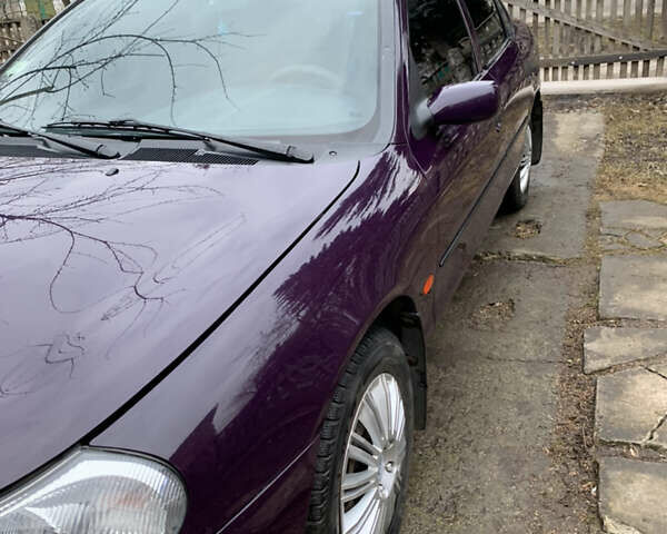 Фиолетовый Форд Мондео, объемом двигателя 1.8 л и пробегом 143 тыс. км за 2900 $, фото 9 на Automoto.ua