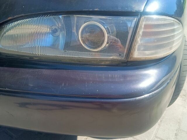 Фиолетовый Форд Мондео, объемом двигателя 1.8 л и пробегом 456 тыс. км за 1000 $, фото 2 на Automoto.ua