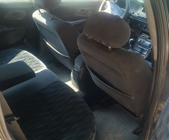 Фиолетовый Форд Мондео, объемом двигателя 1.8 л и пробегом 456 тыс. км за 1000 $, фото 5 на Automoto.ua