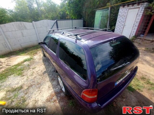 Фиолетовый Форд Мондео, объемом двигателя 2 л и пробегом 232 тыс. км за 1900 $, фото 3 на Automoto.ua