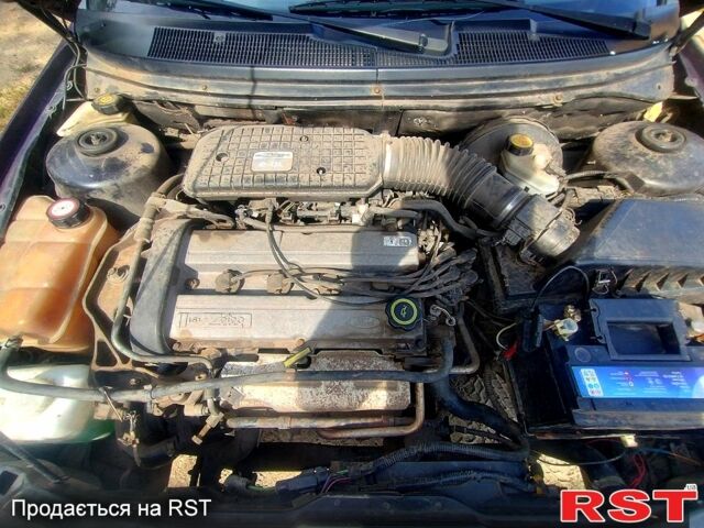 Фиолетовый Форд Мондео, объемом двигателя 2 л и пробегом 232 тыс. км за 1900 $, фото 6 на Automoto.ua