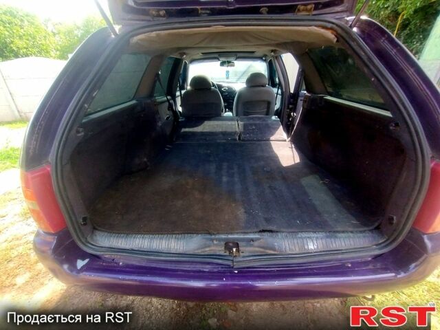 Фиолетовый Форд Мондео, объемом двигателя 2 л и пробегом 232 тыс. км за 1900 $, фото 5 на Automoto.ua