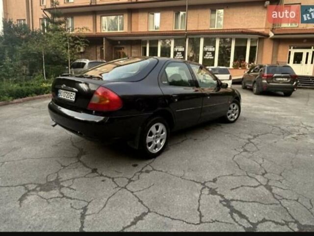 Фіолетовий Форд Мондео, об'ємом двигуна 1.8 л та пробігом 270 тис. км за 1850 $, фото 4 на Automoto.ua