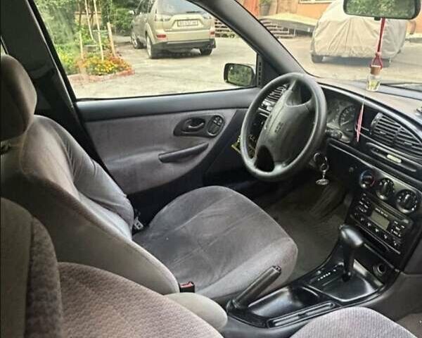 Фіолетовий Форд Мондео, об'ємом двигуна 1.8 л та пробігом 270 тис. км за 1850 $, фото 7 на Automoto.ua