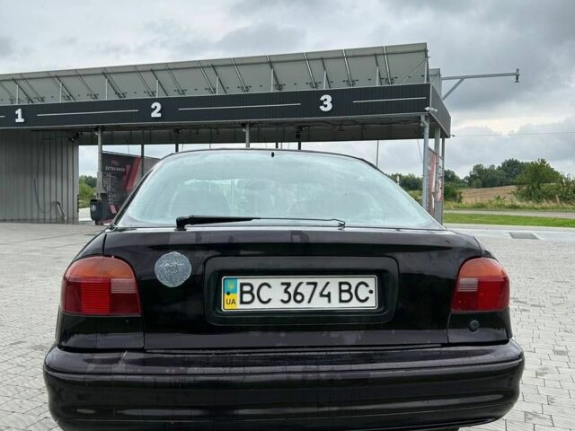 Коричневый Форд Мондео, объемом двигателя 1.6 л и пробегом 290 тыс. км за 500 $, фото 3 на Automoto.ua