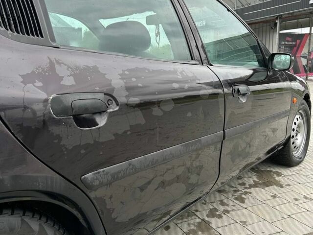 Коричневый Форд Мондео, объемом двигателя 1.6 л и пробегом 290 тыс. км за 500 $, фото 4 на Automoto.ua