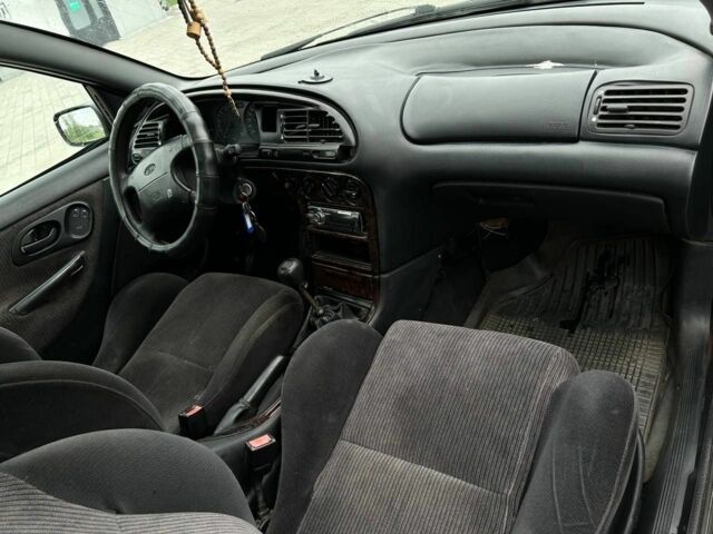 Коричневый Форд Мондео, объемом двигателя 1.6 л и пробегом 290 тыс. км за 500 $, фото 2 на Automoto.ua