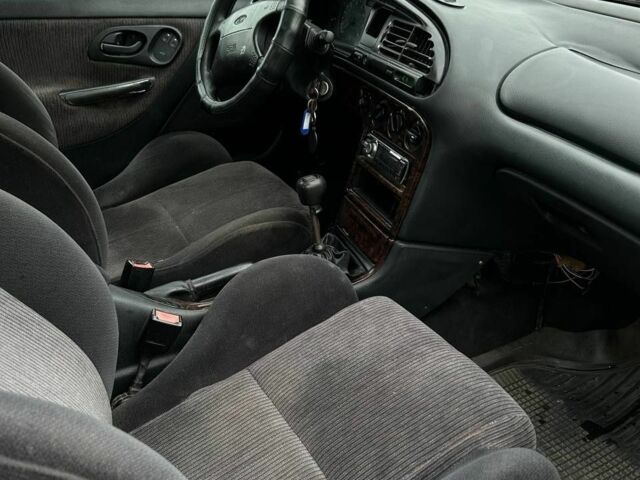 Коричневый Форд Мондео, объемом двигателя 1.6 л и пробегом 290 тыс. км за 500 $, фото 13 на Automoto.ua