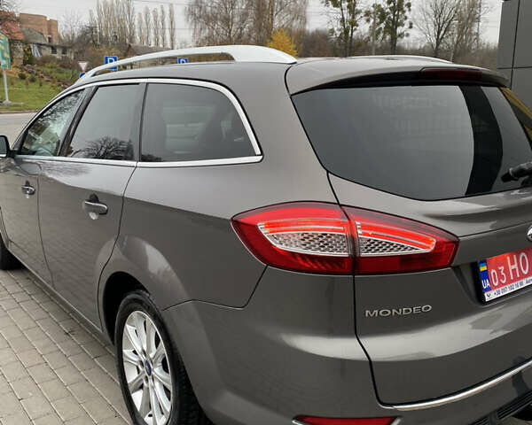 Коричневый Форд Мондео, объемом двигателя 2 л и пробегом 244 тыс. км за 7400 $, фото 3 на Automoto.ua