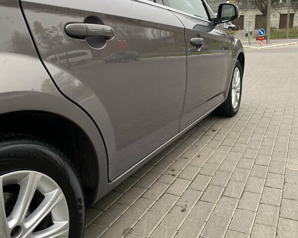 Коричневый Форд Мондео, объемом двигателя 2 л и пробегом 244 тыс. км за 7400 $, фото 11 на Automoto.ua