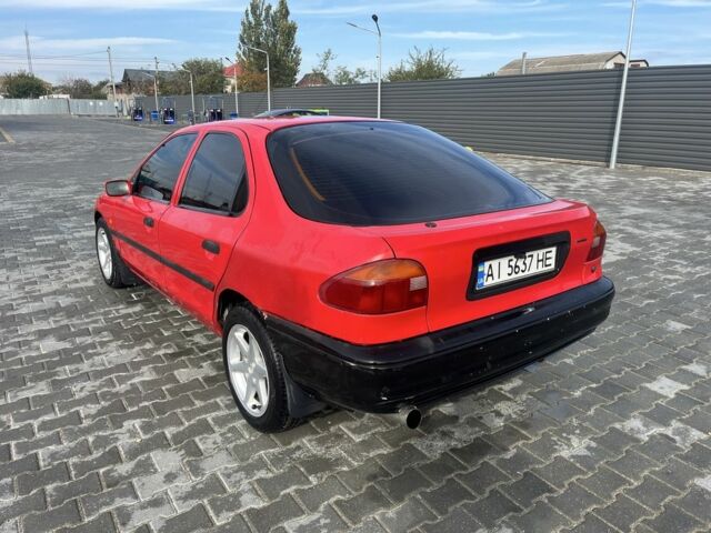 Красный Форд Мондео, объемом двигателя 1.8 л и пробегом 100 тыс. км за 1900 $, фото 2 на Automoto.ua