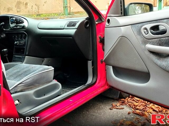 Красный Форд Мондео, объемом двигателя 1.8 л и пробегом 200 тыс. км за 13200 $, фото 1 на Automoto.ua