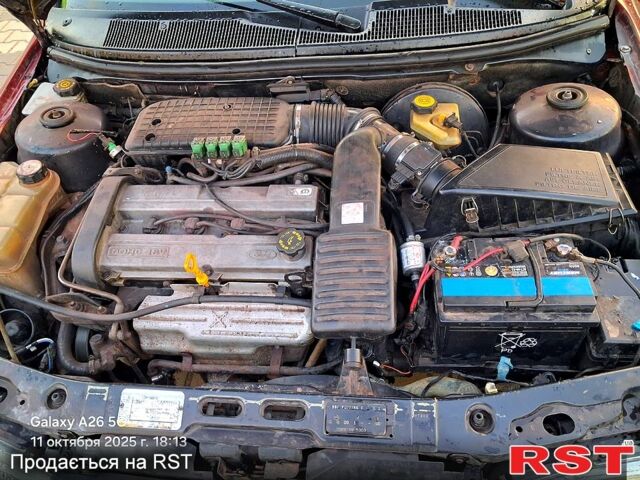 Красный Форд Мондео, объемом двигателя 1.8 л и пробегом 427 тыс. км за 2200 $, фото 12 на Automoto.ua