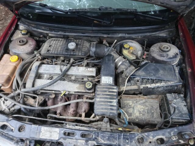 Красный Форд Мондео, объемом двигателя 1.8 л и пробегом 200 тыс. км за 550 $, фото 10 на Automoto.ua