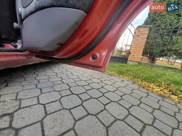 Красный Форд Мондео, объемом двигателя 1.6 л и пробегом 350 тыс. км за 1700 $, фото 12 на Automoto.ua