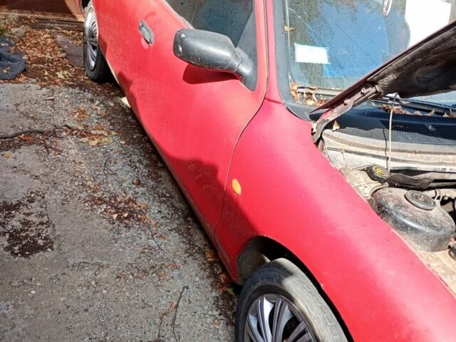 Красный Форд Мондео, объемом двигателя 1.8 л и пробегом 376 тыс. км за 1200 $, фото 2 на Automoto.ua