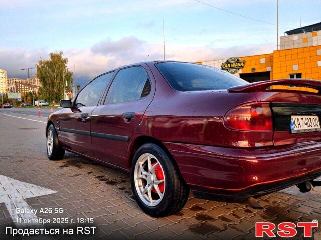 Красный Форд Мондео, объемом двигателя 1.8 л и пробегом 427 тыс. км за 2200 $, фото 3 на Automoto.ua