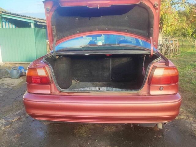 Красный Форд Мондео, объемом двигателя 2 л и пробегом 346 тыс. км за 2500 $, фото 2 на Automoto.ua