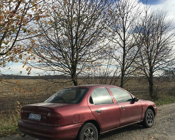 Красный Форд Мондео, объемом двигателя 1.8 л и пробегом 310 тыс. км за 1500 $, фото 4 на Automoto.ua