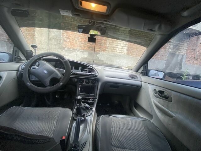 Червоний Форд Мондео, об'ємом двигуна 1.6 л та пробігом 261 тис. км за 1600 $, фото 6 на Automoto.ua