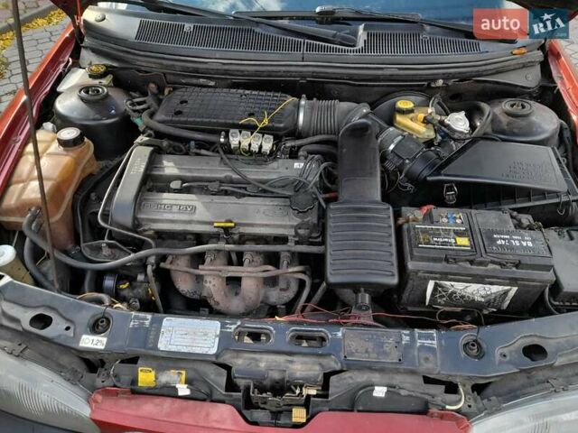 Красный Форд Мондео, объемом двигателя 1.6 л и пробегом 350 тыс. км за 1700 $, фото 9 на Automoto.ua