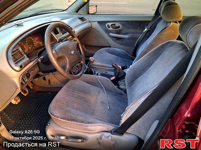 Красный Форд Мондео, объемом двигателя 1.8 л и пробегом 427 тыс. км за 2200 $, фото 8 на Automoto.ua