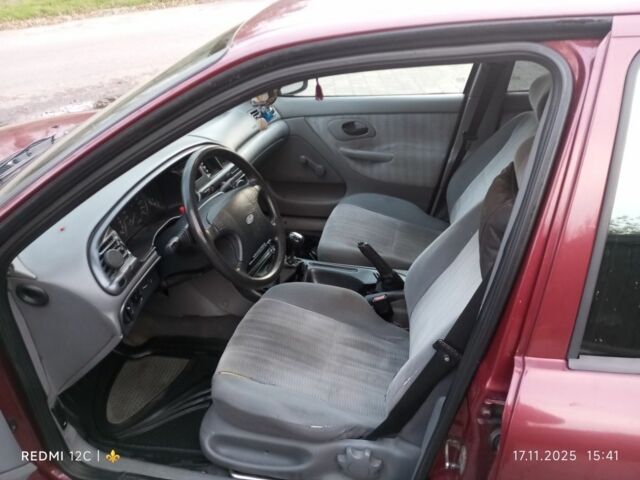 Красный Форд Мондео, объемом двигателя 1.6 л и пробегом 340 тыс. км за 1200 $, фото 7 на Automoto.ua