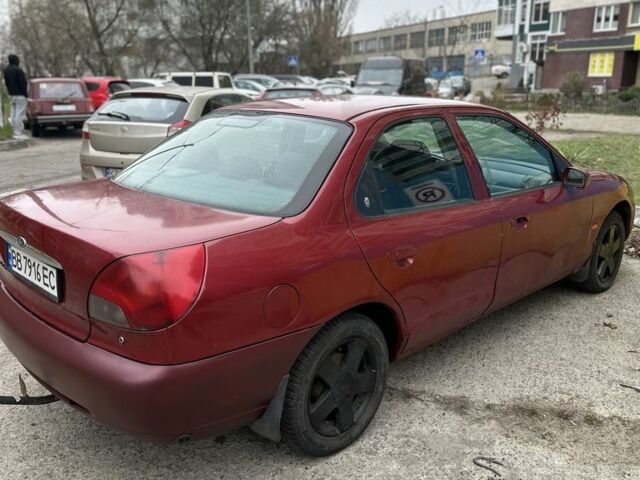 Червоний Форд Мондео, об'ємом двигуна 2 л та пробігом 333 тис. км за 1100 $, фото 1 на Automoto.ua