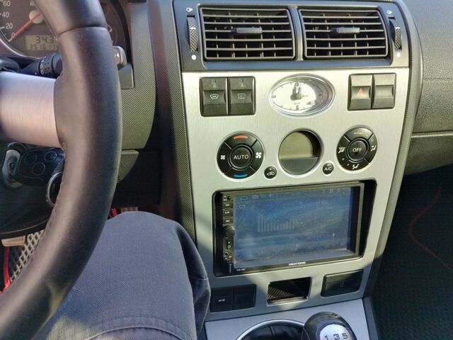 Красный Форд Мондео, объемом двигателя 1.8 л и пробегом 352 тыс. км за 3000 $, фото 7 на Automoto.ua