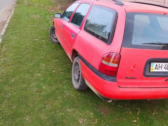 Красный Форд Мондео, объемом двигателя 1.8 л и пробегом 256 тыс. км за 800 $, фото 1 на Automoto.ua