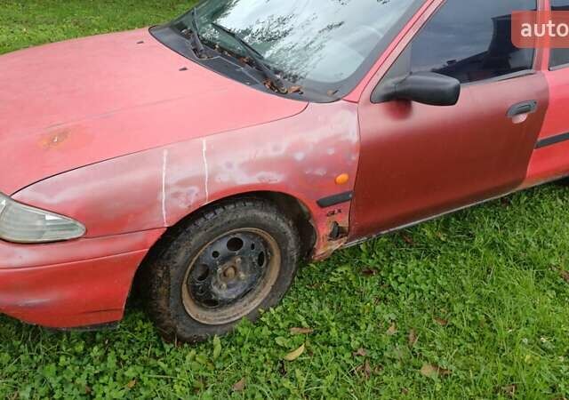 Красный Форд Мондео, объемом двигателя 1.8 л и пробегом 430 тыс. км за 900 $, фото 4 на Automoto.ua