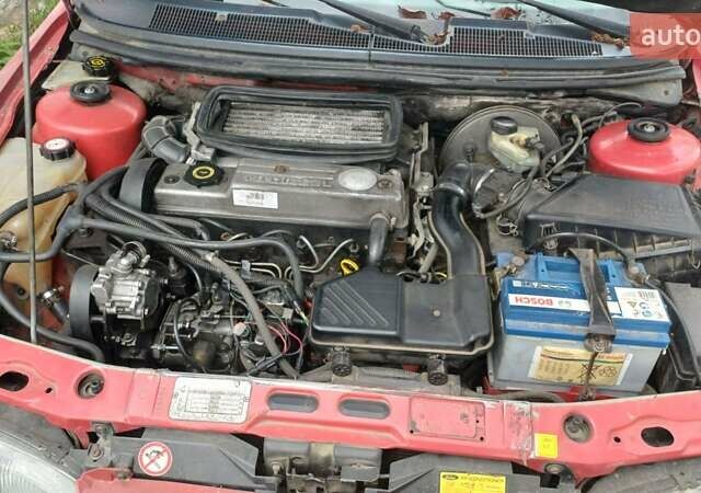 Красный Форд Мондео, объемом двигателя 1.8 л и пробегом 430 тыс. км за 900 $, фото 1 на Automoto.ua