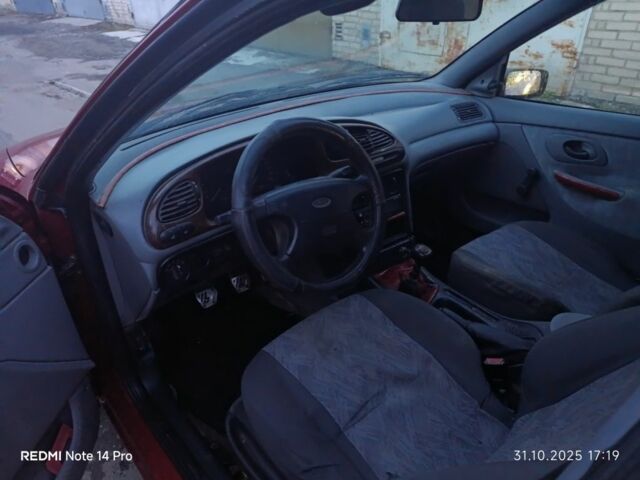 Червоний Форд Мондео, об'ємом двигуна 1.8 л та пробігом 300 тис. км за 1050 $, фото 6 на Automoto.ua