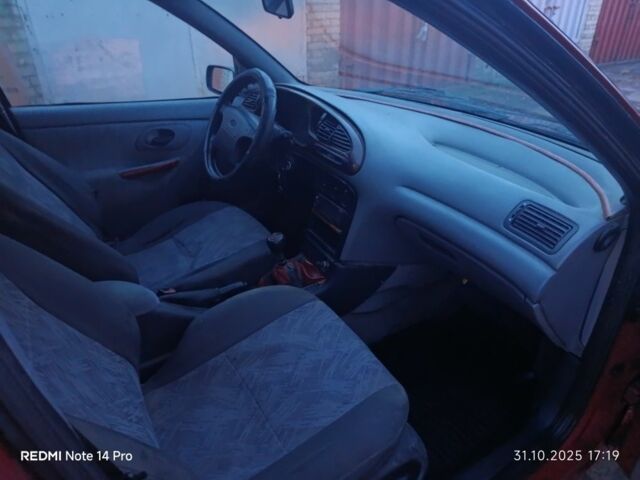 Червоний Форд Мондео, об'ємом двигуна 1.8 л та пробігом 300 тис. км за 1050 $, фото 7 на Automoto.ua