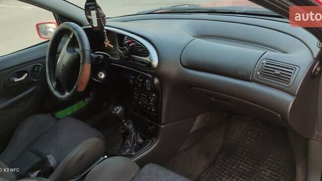 Красный Форд Мондео, объемом двигателя 1.8 л и пробегом 370 тыс. км за 1900 $, фото 5 на Automoto.ua