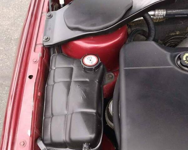 Красный Форд Мондео, объемом двигателя 1.8 л и пробегом 306 тыс. км за 3900 $, фото 10 на Automoto.ua