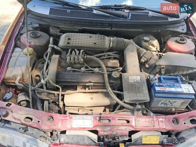 Червоний Форд Мондео, об'ємом двигуна 1.8 л та пробігом 413 тис. км за 1350 $, фото 33 на Automoto.ua