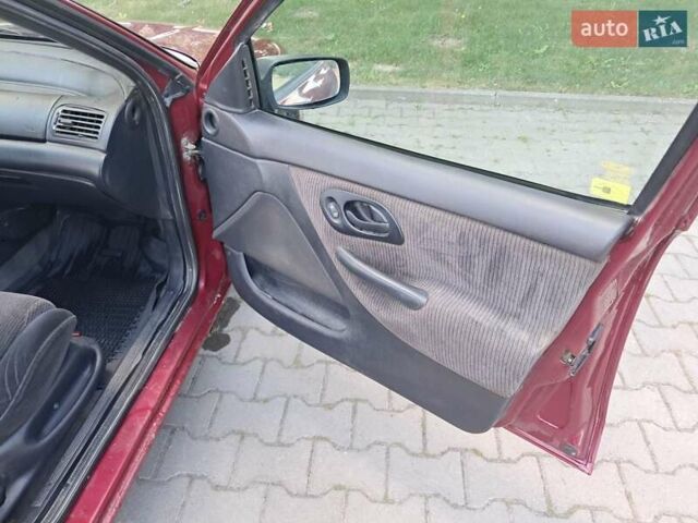 Червоний Форд Мондео, об'ємом двигуна 1.8 л та пробігом 413 тис. км за 1350 $, фото 18 на Automoto.ua