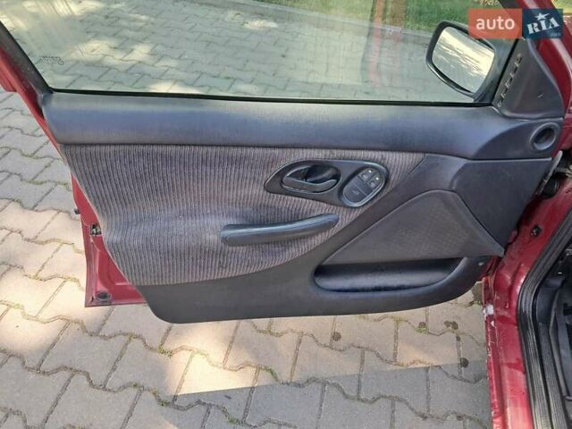 Червоний Форд Мондео, об'ємом двигуна 1.8 л та пробігом 413 тис. км за 1350 $, фото 24 на Automoto.ua