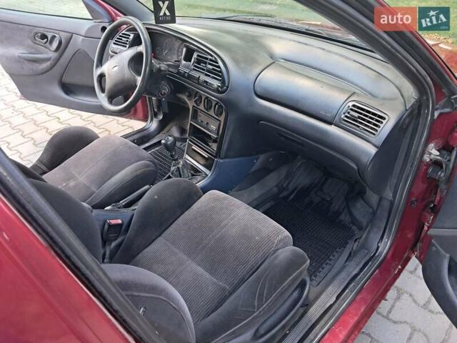 Червоний Форд Мондео, об'ємом двигуна 1.8 л та пробігом 413 тис. км за 1350 $, фото 17 на Automoto.ua