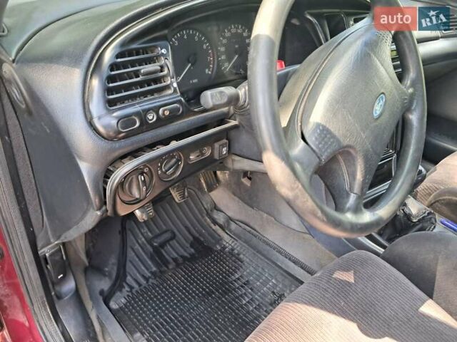 Червоний Форд Мондео, об'ємом двигуна 1.8 л та пробігом 413 тис. км за 1350 $, фото 23 на Automoto.ua