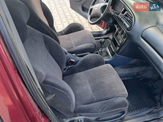 Червоний Форд Мондео, об'ємом двигуна 1.8 л та пробігом 413 тис. км за 1350 $, фото 15 на Automoto.ua