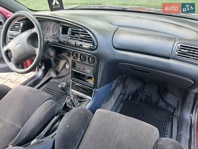 Червоний Форд Мондео, об'ємом двигуна 1.8 л та пробігом 413 тис. км за 1350 $, фото 16 на Automoto.ua