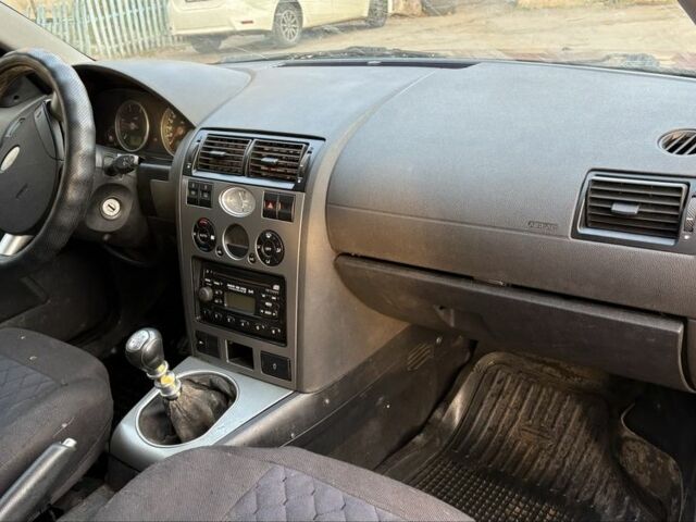 Красный Форд Мондео, объемом двигателя 2 л и пробегом 280 тыс. км за 1450 $, фото 11 на Automoto.ua