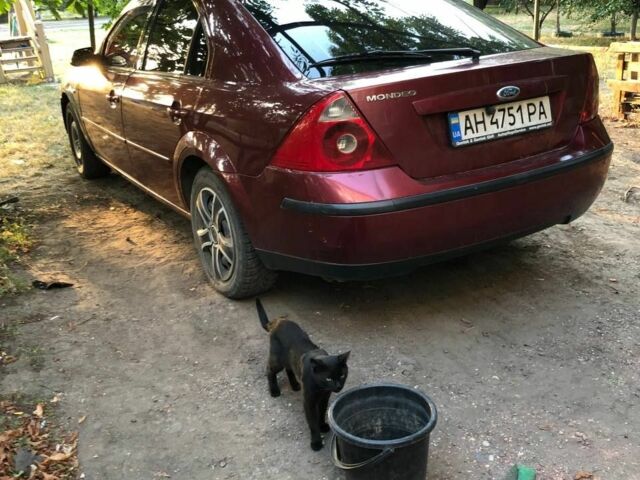 Красный Форд Мондео, объемом двигателя 2 л и пробегом 260 тыс. км за 2500 $, фото 1 на Automoto.ua